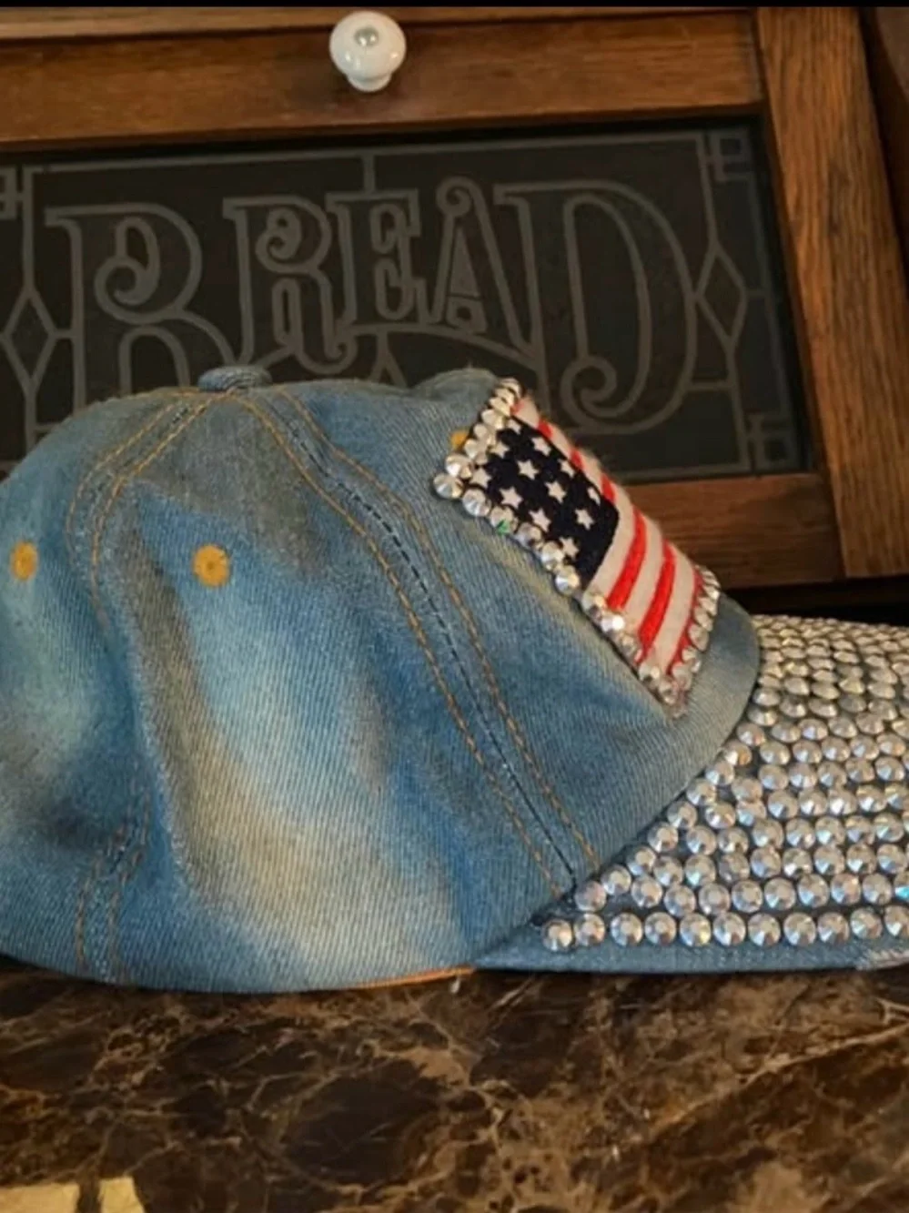 Adult Rhinestone Flag Denim Cap - Blue. $20 each.
